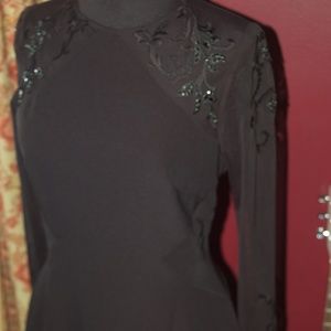 Black Dress. pretty embellishments, knee length